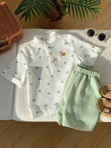 SHEIN 2pcs/Set Young Boy Cartoon Coconut Tree Pattern Mandarin Collar Short Sleeve Half-Zip Pullover Top And Elastic Waist Solid Color Shorts,Kids - White - View 5