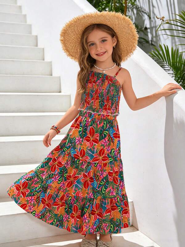 SHEIN Conjunto de 2 piezas de camiseta de tirantes y falda con estampado de hojas tropicales para niñas, adecuado para vacaciones de verano, playa y ropa de resort