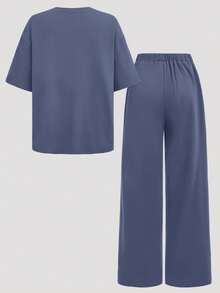 SHEIN Girlism Bộ 2 món dành cho nữ tuổi teen, áo thun tay raglan cổ tròn dáng rộng thoải mái và quần short in họa tiết, áo thun dệt kim nhẹ và quần short có dây rút, phù hợp cho mặc hàng ngày, đi học, nghỉ lễ và các hoạt động ngoài trời. - Màu xanh bụi bặm - Xem 2