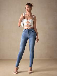 Selenza Quần jean denim rách cạp cao co giãn dành cho nữ cỡ lớn, kiểu vintage, dáng ôm sát, ống quần thon gọn. - Rửa trung bình - Xem 3