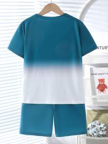 SHEIN Fantacosmos Bộ đồ thể thao 2 mảnh cho bé trai tuổi teen: Áo thun ngắn tay và quần short in chữ kiểu ombre, phong cách thường ngày. - trái cam - Xem 2