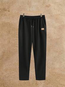 HIMLAND Men's Casual Everyday Commute Simple Versatile Letter Graphic Decor Short Sleeve T-Shirt And Drawstring Waist Long Pants Set, Spring/Summer/Autumn ,Men's Black Short Sleeve Tracksuit Set , Casual Summer Jogging Suit For Men ,Solid Color Crew Neck T-Shirt And Joggers ,Breathable Gym Workout Clothes Set ,Streetwear Style Lounge Set With Patch ,Soft Blend 2 Piece Outfit ,Travel Outfit Airport Style Men ,Men's 2 Piece Casual Tracksuit Men Summer Sweatsuit Mens Co-Ord Set Mens Jogger Set Men 2 Piece - Black - View 9