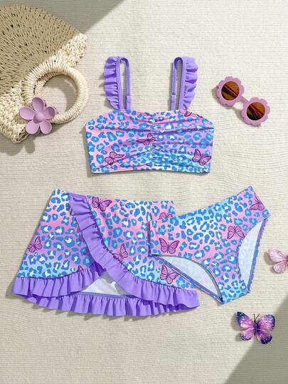SHEIN Young Girls Bikini Sets,This 3-Piece Girls' Swimsuit Set Is A New Spring/Summer Beach Swimwear Arrival. It Includes A Spaghetti Strap Swim Top, Shorts, And A Cover-Up Skirt. The Adorable Flamingo Print Makes Girls Even Cuter, While Ruffled Details Add A Sweet And Lovely Touch. Perfect For Spring And Summer, This Is A Relaxing Vacation Swimsuit.