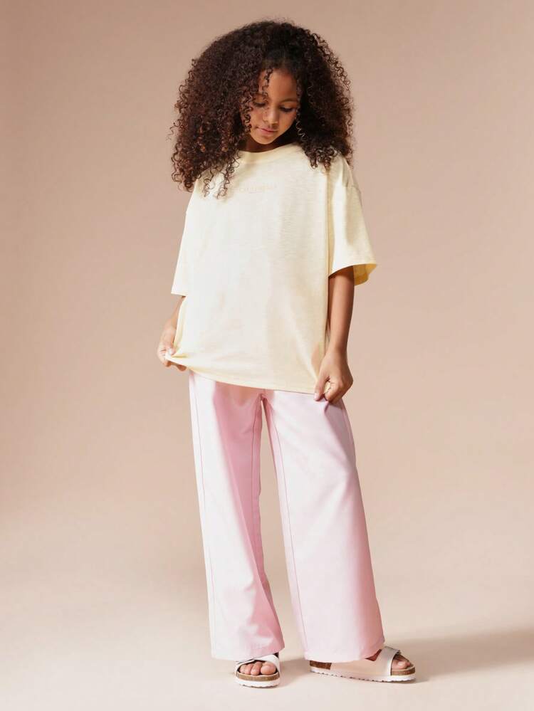 Set aus übergroßem T-Shirt mit Papaya-Print und weit geschnittener Hose