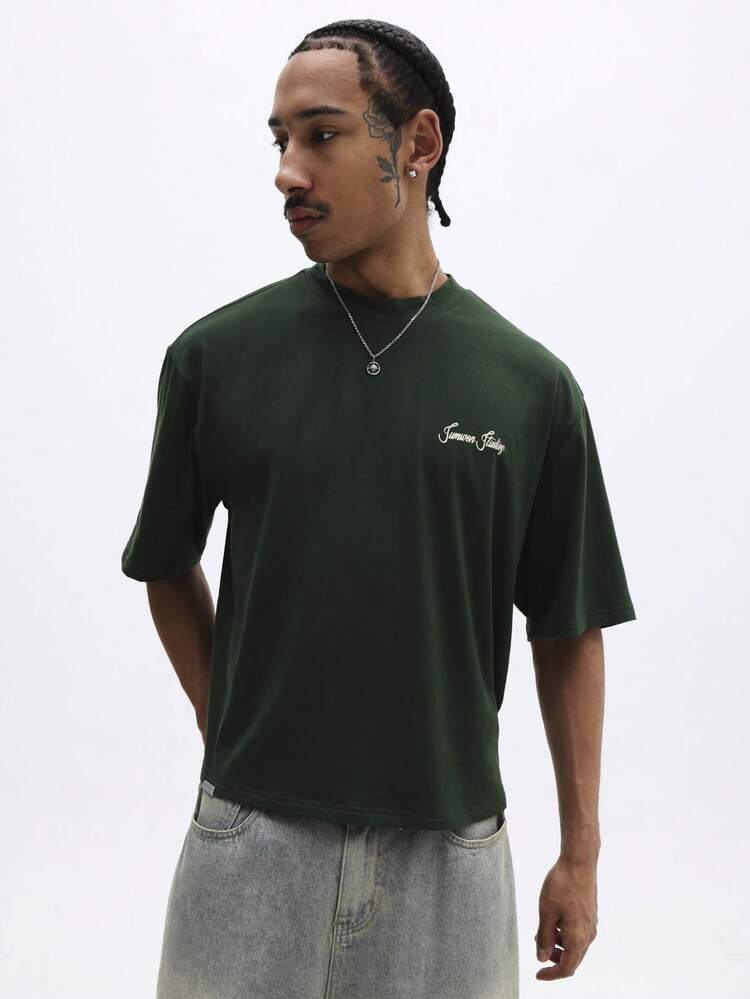 SUMWON T-shirt graphique à col ras-du-cou oversize à manches courtes pour hommes avec imprimé texte "Winning" en coton vert forêt, streetwear décontracté pour l'été
