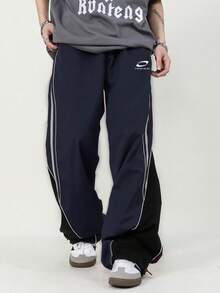 Manfinity Sport Corelite Men's Casual Sports Pants With Strap Design And Small Prints, Comfortable And Versatile