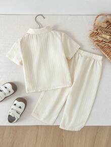 SHEIN 2pcs Baby Boy Vintage Textured Ribbed Polo Collar Shirt And Simple Long Pants Set, Suitable For Home And Outings - White - View 2