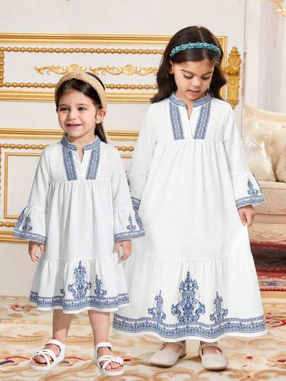 SHEIN Minimalistiskt tryckt långärmad klänning för babyflickor