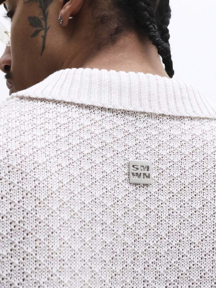 Polo à manches courtes en maille avec col pointu