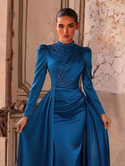 Aureia Elegant Peacock Blue Satin Stand Collar Long Sleeve Dress With Pleated Front, Embellished With Luxurious Handcrafted Beaded Decoration, Waist Belt, And Flared Fishtail Hem, Suitable For All Formal Occasions - Conservative, Novel, Elegant Long Party Dress, Wedding Guest Attire, Luxury Evening Gown, Middle Eastern Evening Dress, Formal Dinner Dress