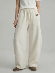 Ontre 2026春夏女装梭织条纹浪漫情人节杏色喇叭裤，宽松版型，适合独立日、都市时尚、简约通勤穿着。 - 杏色 - 查看 2