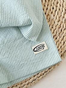 SHEIN Set de 2 piezas Conjunto casual de verano para niños pequeños - Camisa de manga corta a rayas con cuello y botones de contraste, y pantalones cortos a juego a rayas, adecuado para uso diario, vacaciones y días festivos - Verde - Ver 6