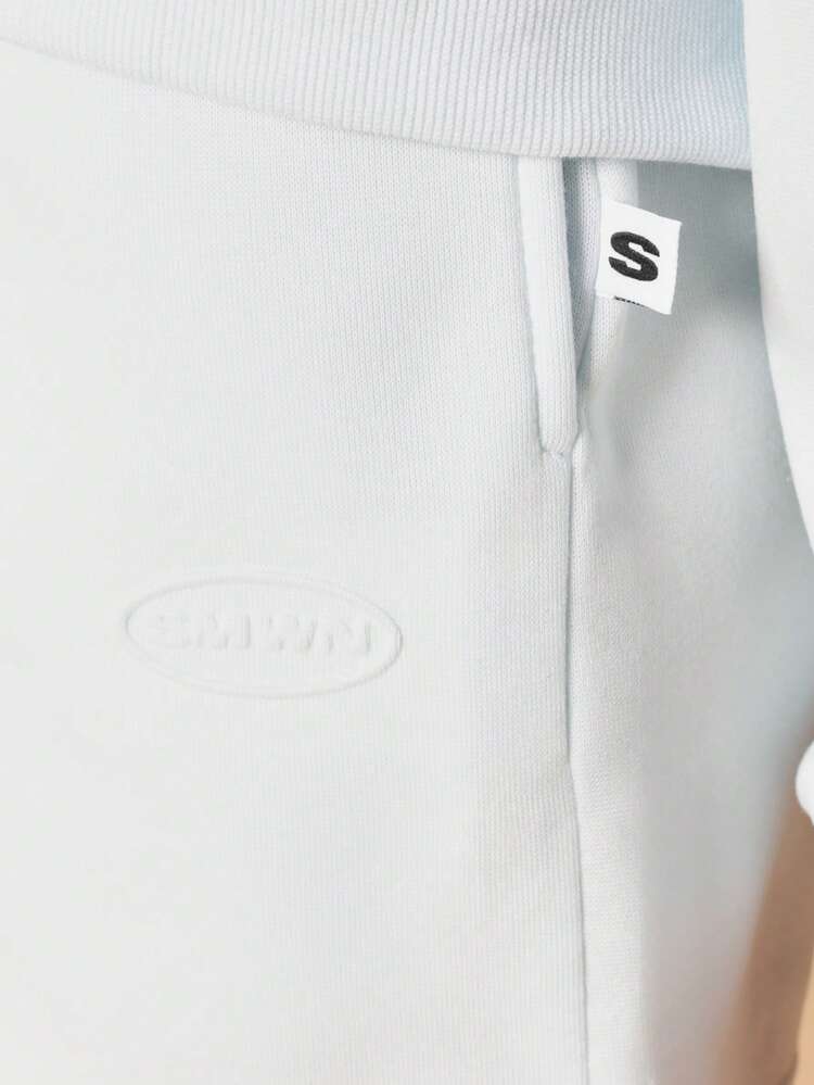 Conjunto de sudadera con capucha y pantalones cortos con cremallera