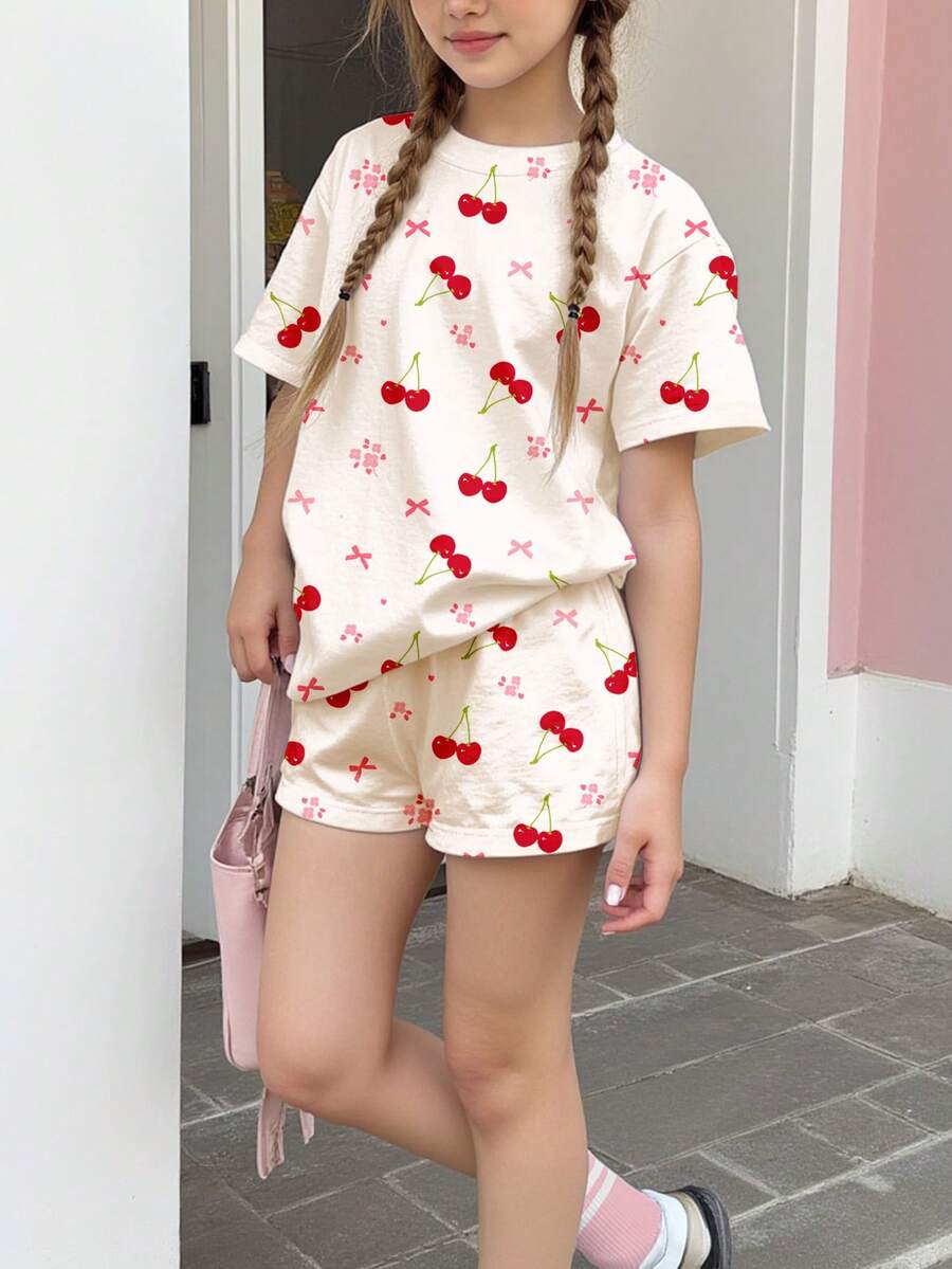 Bộ áo thun và quần short cổ tròn tay ngắn màu trắng kem, nơ retro ngọt ngào, họa tiết hoa anh đào và hoa nhí, phong cách tối giản thoải mái, mềm mại, phù hợp cho bé gái tuổi teen mặc hàng ngày vào mùa xuân/hè, phong cách đường phố, đi chơi, ở nhà, đi nghỉ mát. - Nhiều màu - Xem 1
