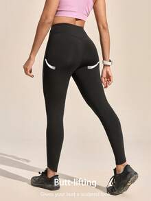 Exploreva Women's Outdoor Sports Reflective Stripe Pocket Zipper Black Yoga Leggings - Black - View 2