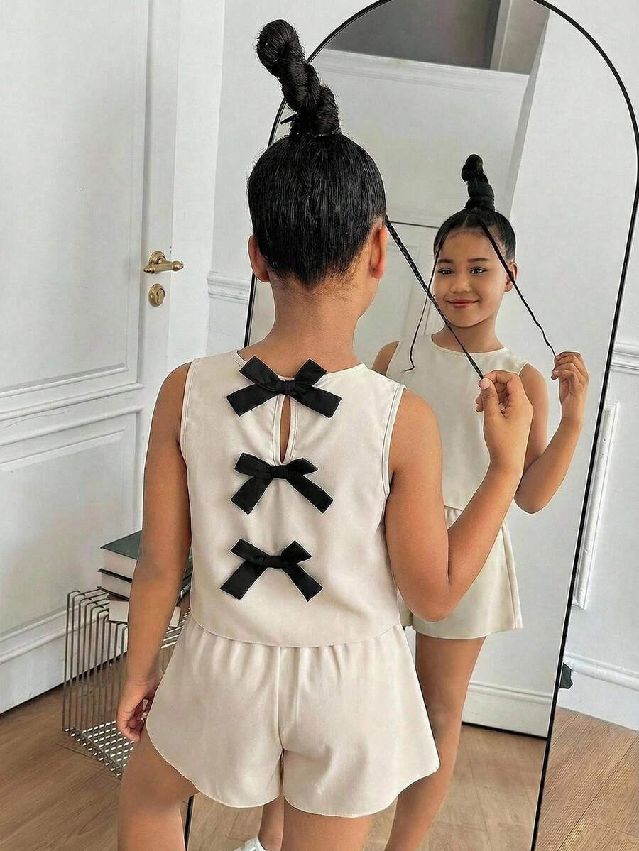 SHEIN 2件套少女休闲纹理面料蝴蝶结露背吊带背心和短裤套装 - 杏色 - 查看 1