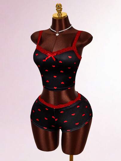 Amplova 2 st. set med kontrastfärgade spetsmönster, rosettdekorationer och minishorts