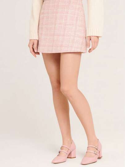 Tacones rosas con tacón medio. Tacones cuadrados medianos.