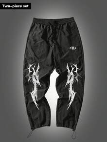 Manfinity Sport Corelite Bộ đồ thể thao nam gồm áo thun tay ngắn raglan in họa tiết Gothic và quần dài. - màu đen - Xem 6