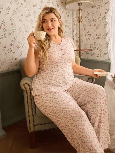 SHEIN Conjunto de pijama de top de manga corta y pantalones con estampado floral diminuto para mujer de talla grande