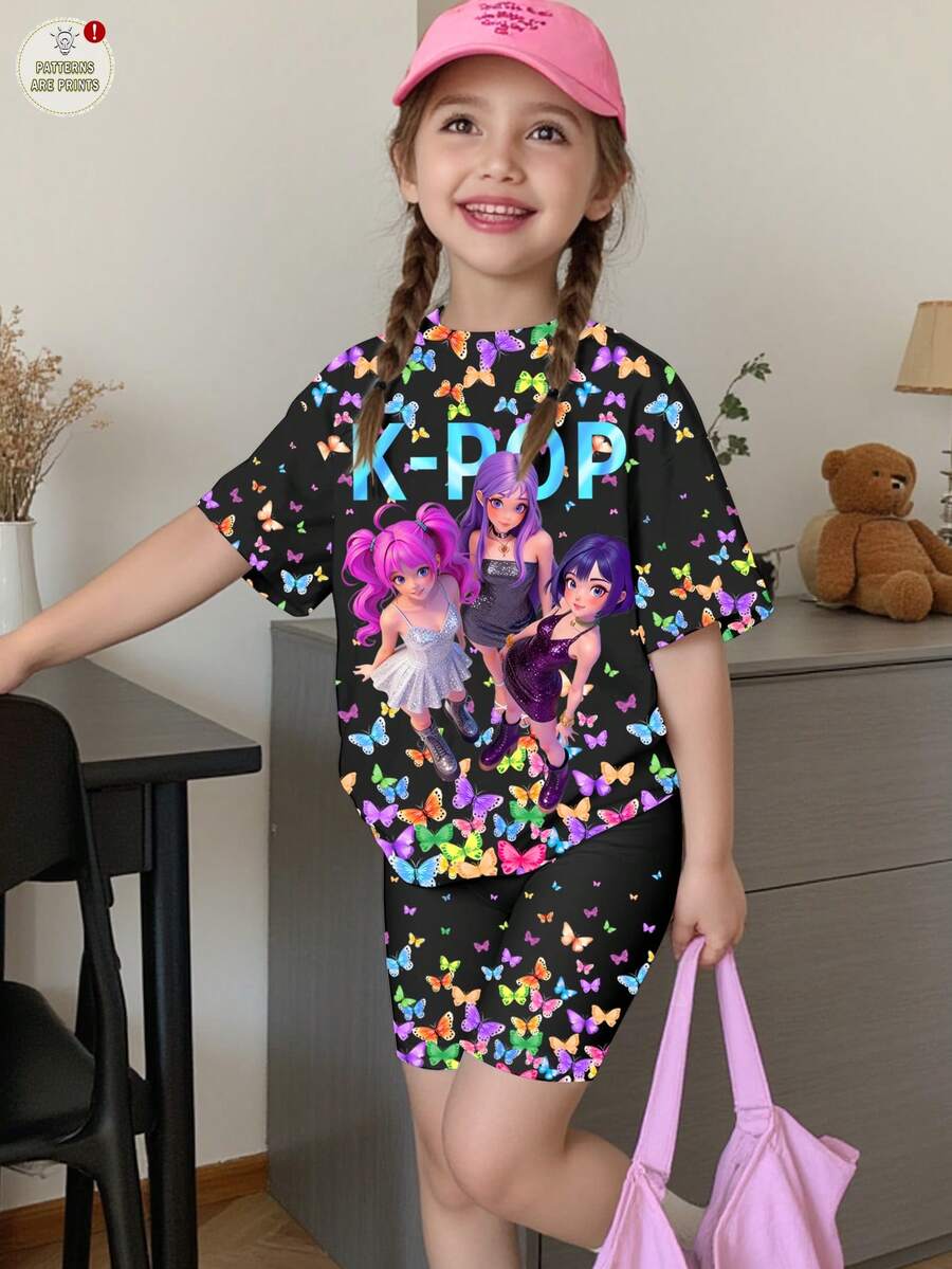 SHEIN Bộ áo thun ngắn tay cổ tròn in chữ và hoạt hình dành cho bé gái, gồm áo và quần short, thích hợp cho các kỳ nghỉ, tiệc tùng và mặc hàng ngày. - Nhiều màu - Xem 1