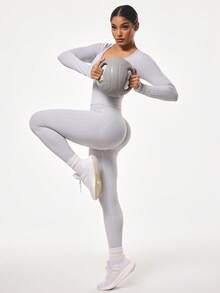 Slayform Bộ đồ thể thao gồm áo dài tay và quần legging màu trơn. - Xám - Xem 7