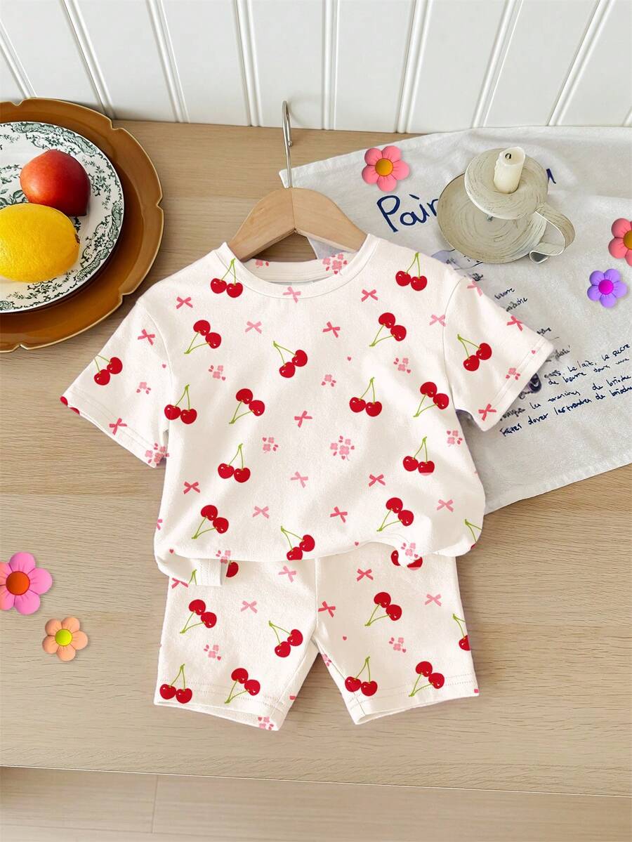 SHEIN 2pcs Baby Girl Casual Loose Fit Cherry, Floral, Bow Print Short Sleeve Round Neck T-Shirt And Skinny Bike Shorts Set, Suitable For Spring/Summer Daily Wear, Outings, Home, School - Multicolor - View 1