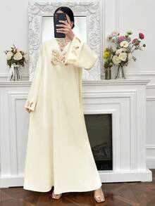 Yasmyna رمضان فستان أنيق بأكمام طويلة وياقة ربطة عنق مزين بترتر على شكل فراشة بطراز عربي - لون مشمشي - مشاهدة 5