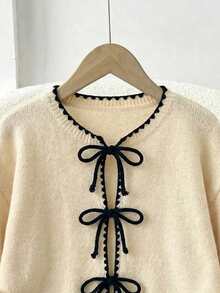 SHEIN Frenchy Áo cardigan dệt kim màu mơ Pháp ấm áp, thanh lịch, kiểu dáng thường ngày, phù hợp cho công sở, với cổ áo và nơ tương phản, thoải mái và ấm áp, thích hợp cho mùa xuân/hè, dành cho nữ. - Nhiều màu - Xem 3