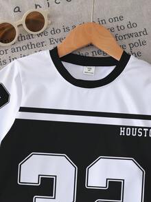 一套幼儿运动风黑白数字“32”印花短袖短裤套装，非抓绒材质。适合日常运动、郊游、春夏季穿着。 - 彩色 - 查看 4