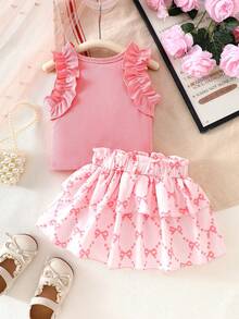 1 set Top à manches courtes avec volants et imprimé nœud et jupe à volants pour bébé fille. Style mignon et girly. Ensemble léger et respirant de 2 pièces adorable pour les sorties quotidiennes et les jeux. Tenue de mode printemps et été - Vieux Rose - Voir 2