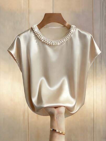 Islaluna Women's Champagne-Colored Elegant Round Neck Bat-Print Short-Sleeved Shirt With Pearl Embellishments Women's Shirts For Spring And Summer Women's Tops  Pullover Shirt Loose-Fitting Shirt High-End Satin Shirt Summer Women's Clothing Elegant Women's Blouses  Elegant Blouses For Ladies Women's Pearl Top Women's  Satin Blouses Women's Classy Blouses Women's Bling Top Women's  Loose Fit Top Suitable For Commuting, Everyday Elegance For Women  Fashionable Casual Commuter Wear Business Office Wear Versatile And Stylish Everyday Casual Wear Urban Teacher's Professional Attire Summer Blouse 
For Women  Party Top Summer Holiday Outfits Women's Solid-Colored Tops