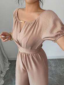 Rafferiza Elegant Khaki Jumpsuit For Women, Featuring A Round Neck, Knotted Waist, And Wide-Leg Design With Wooden Bead Embellishments. This Long Summer Jumpsuit Is Perfect For Women's Holidays, With Vintage Wooden Bead Details, Puff Sleeves, Knotted Straps, And Textured, Pleated Fabric. - Khaki - View 7