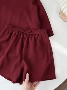 SHEIN LMoss Kids Conjunto informal de camiseta de manga corta holgada de cuello redondo de punto de unicolor y pantalones cortos para niñas preadolescentes - Burdeos - Ver 8