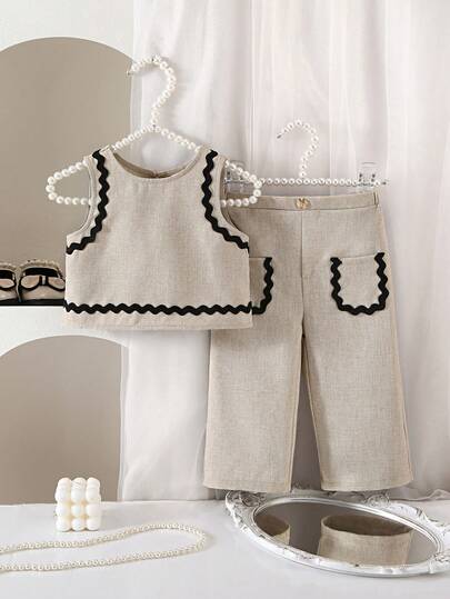SHEIN This 2-Piece Cute Baby Girl Casual, Simple, And Adorable Khaki Vest And Trousers Set With Ribbon Embellishments Is Suitable For Birthday Parties, Evening Parties, Performances, Weddings, Baptisms, Opening Ceremonies, Everyday Wear, School, Outings, And Spring/Summer Seasons.
