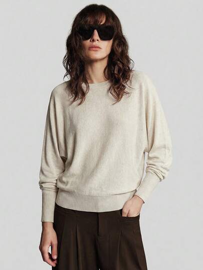 Ontre Women's Solid Color Round Neck Dropped Shoulder Loose Casual Knit Sweater