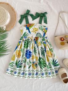 SHEIN Young Girl Tropical Print Spaghetti Strap Dress, Vacation Young Girls Dresses Kids Summer Dresses Kids Clothes Girls Tropical Print Sundress With Tie Shoulder Straps Kids Summer Beach Dress Toddler Girl Floral And Leaf Pattern Mini Dress With Bow Details Comfortable Summer Outfit For Play Tropical Print Kids Dress Casual Dress For Kids Beach Dress For Kids - White - View 4