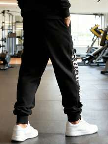 GymBeat Quần ống rộng có túi, họa tiết đầu lâu thời trang - màu đen - Xem 2