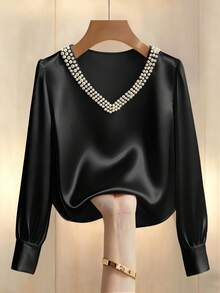 Franclia Modna i słodka bluzka damska z perłowym zdobieniem, dekoltem w serek, długim rękawem, na co dzień i na lato - Czarne - Zobacz 1
