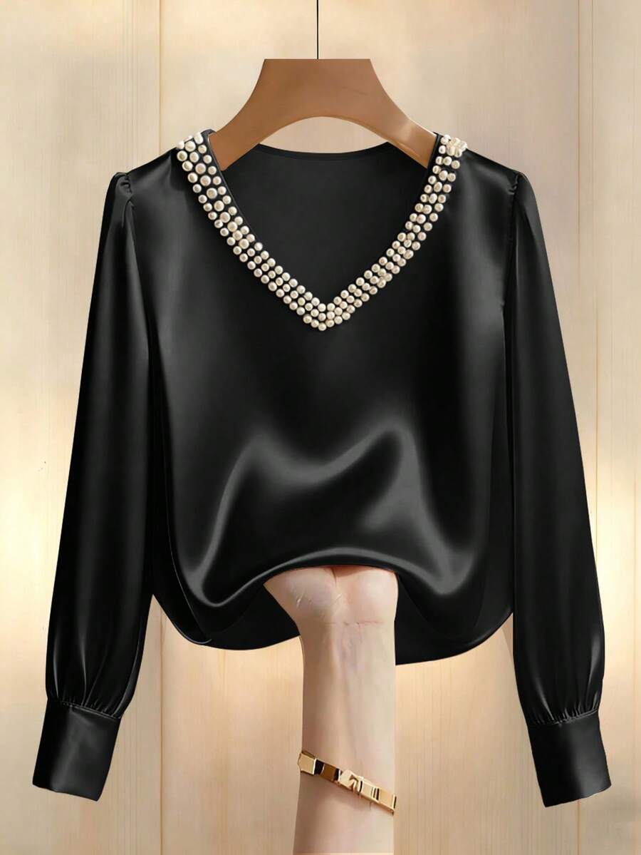Franclia Modna i słodka bluzka damska z perłowym zdobieniem, dekoltem w serek, długim rękawem, na co dzień i na lato - Czarne - Zobacz 1
