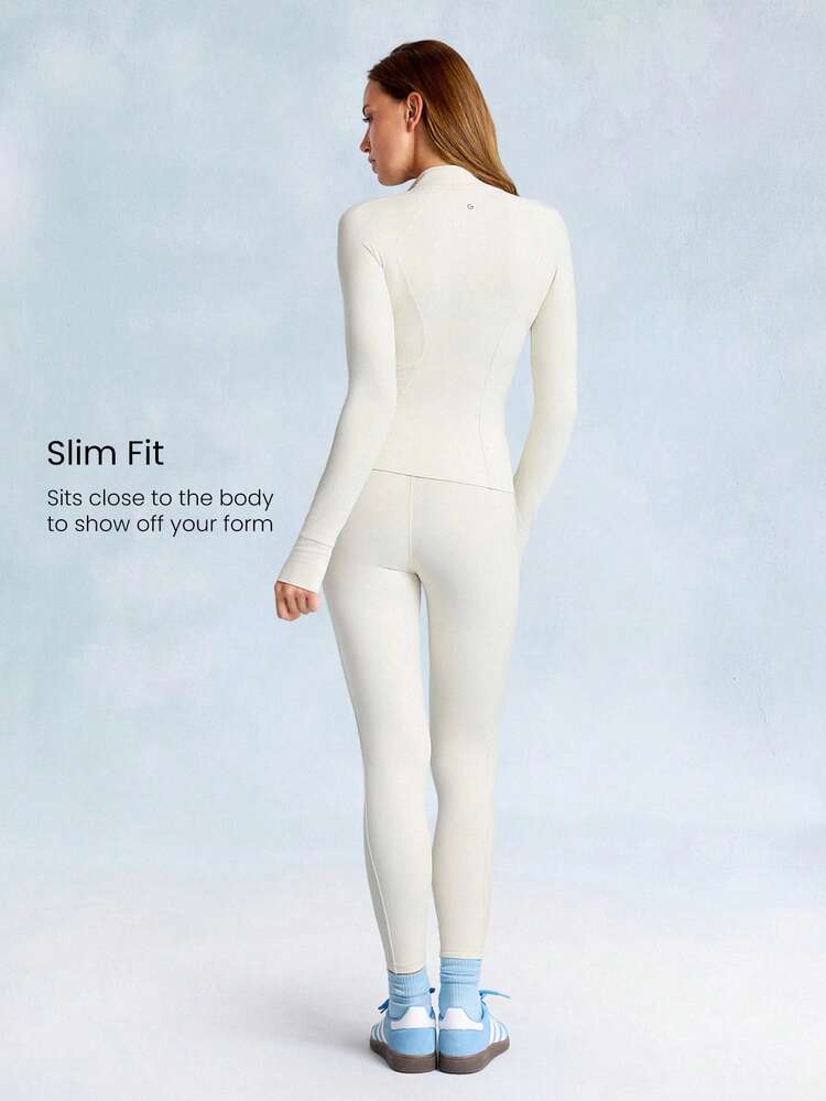 Giacca con chiusura lampo FeatherFit™ Arctic Flow, morbida e stirabile, con pannelli laterali a costine, polsini con foro per il pollice, vestibilità slim, adatta per yoga a basso impatto, uso quotidiano e casual