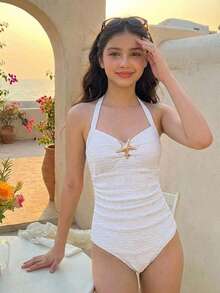 少女度假露背V领金属海星贝壳流苏装饰纹理针织连体泳衣