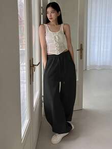 DAZY Quần thể thao nữ chạy bộ có túi xéo, dây rút ở eo - màu đen - Xem 3