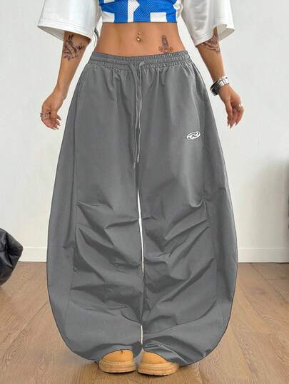 Coolane Women's & Men's Summer Festival Couple Same Style Vintage Sportswear Embroidered Graphics Plaid Corta Vento Textured Baggy Parachute Scimitar Pants