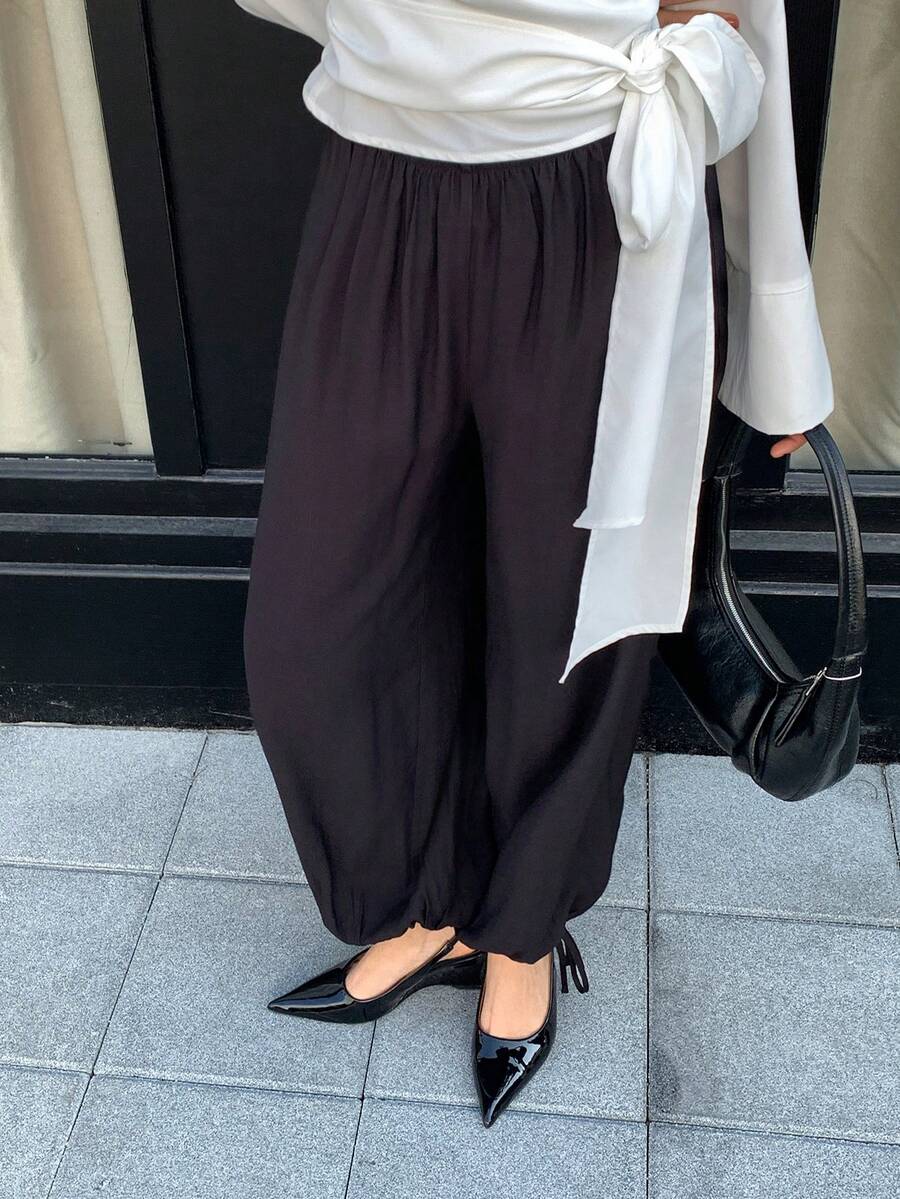 Solavon 黑色灯笼裤，黑色松紧腰阔腿抽绳裤脚裤 - 休闲裤，适合旅行、工作和街头时尚造型，女士休闲百搭纯色抽绳宽松裤，百搭黑色长裤，周末穿搭灵感，时尚休闲裤 - 黑色 - 查看 1