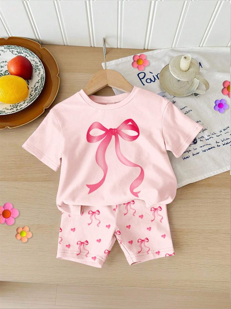 SHEIN 2pcs/Set Baby Girl Casual Loose Round Neck Short Sleeve T-Shirt And Shorts Set, Featuring Cute Heart And Bow Print, Suitable For Spring/Summer Daily Wear, Outings, Home, School - Multicolor - View 1