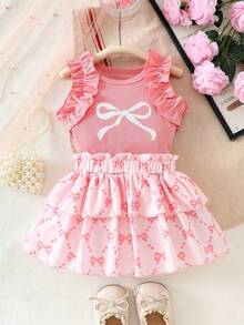 1 set Top à manches courtes avec volants et imprimé nœud et jupe à volants pour bébé fille. Style mignon et girly. Ensemble léger et respirant de 2 pièces adorable pour les sorties quotidiennes et les jeux. Tenue de mode printemps et été - Vieux Rose - Voir 7