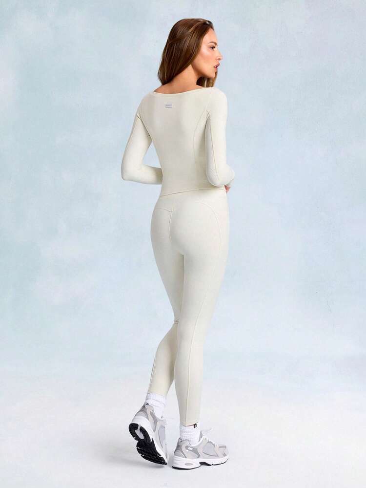 FeatherFit™ Momentum Buttery-Soft Stretch z dzielonym szwem, talia, długi rękaw, koszulka z otworami na kciuki, do codziennego noszenia na co dzień, do studia jogi o niskim wpływie