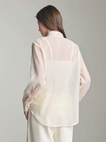 Ontre Áo sơ mi nữ 2026ss màu trắng cổ điển, chất liệu organza mỏng nhẹ, dáng rộng, cổ đứng, vai rớt, tay dài, dây mảnh thoải mái và ruy băng trang trí, trang phục dự tiệc cưới hiện đại, thanh lịch, tối giản, lãng mạn kiểu Pháp, sang trọng, phù hợp với đô thị, công sở, mang hơi hướng quý tộc cổ điển, cao cấp cho sân bay, du thuyền, và các sự kiện ở Trung Đông. Áo nữ đa năng chất lượng cao, thiết kế đặc biệt cho ngày Valentine, cao cấp, thanh lịch, cổ điển. - Màu be - Xem 6