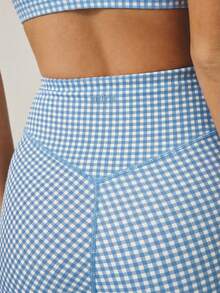Aralina Bộ đồ thể thao năng động gồm áo hai dây crop top và quần short cạp cao in họa tiết kẻ caro, thích hợp cho tập luyện thể dục thể thao. - Màu xanh lam - Xem 6